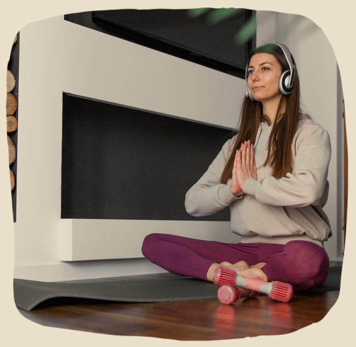 Woman meditating in wellness space