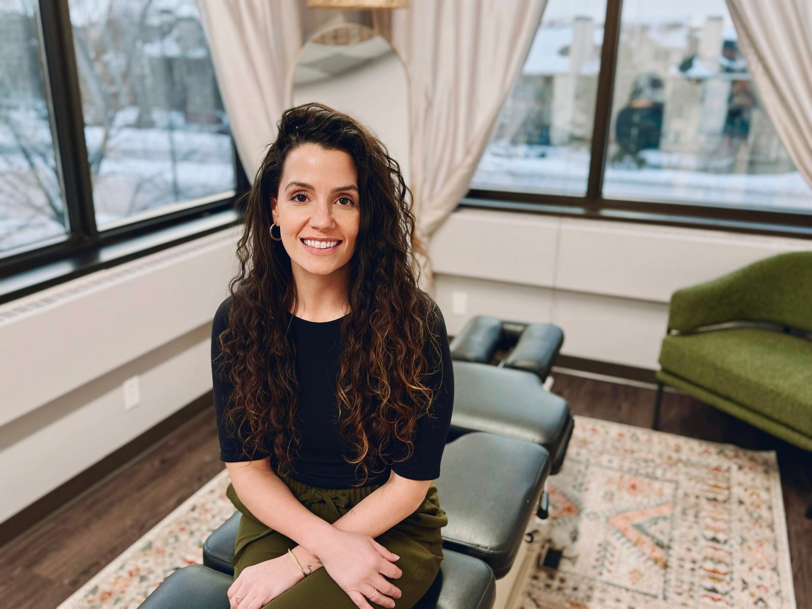 Woman meditating in wellness space